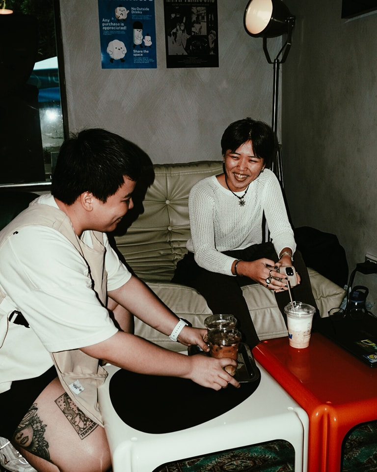 Barista chatting with a customer
