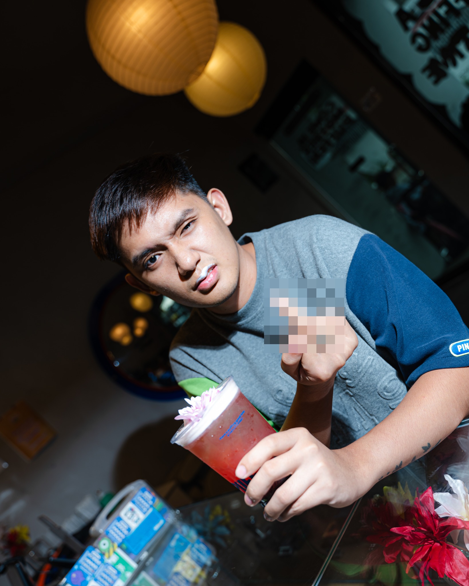 Customer at PUFF with a signature drink